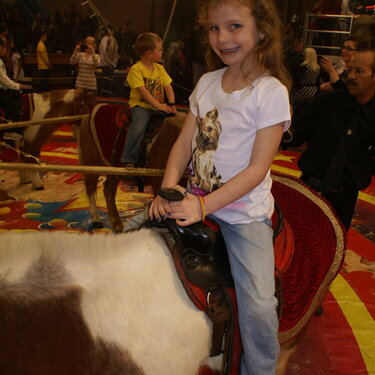 Stormy riding a pony at the Circus.
