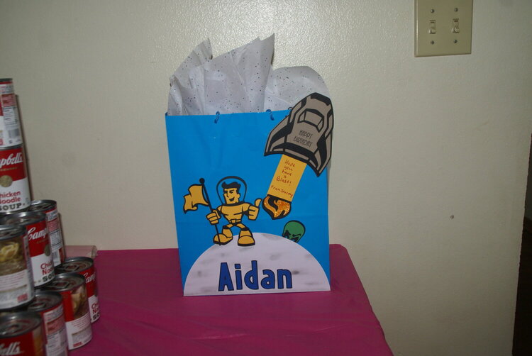 Gift bag shown with card open