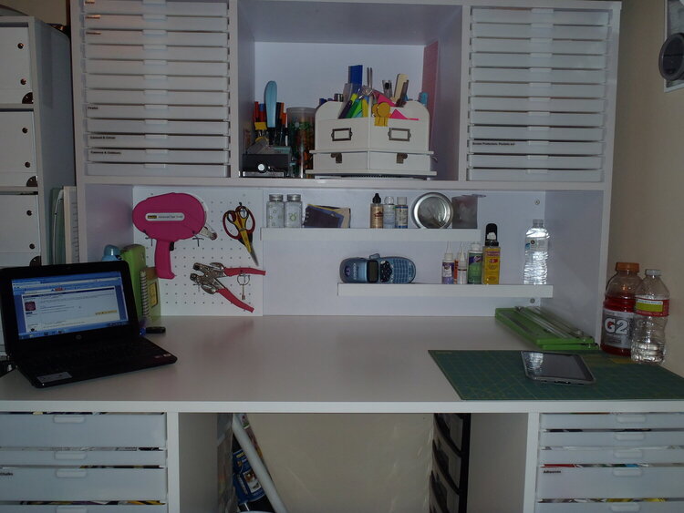 This is the 2 little shelves &amp; peg board I added to the back of my hutch.