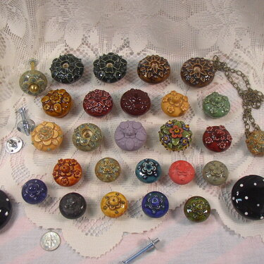 various  ceramic flowered knobs