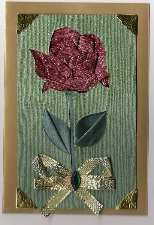 Fancy Folded/Iris folded Christmas rose. Pattern by Ria.