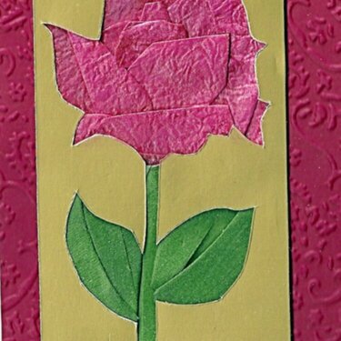 Fancy folded Iris foled rose. Pattern by Ria.