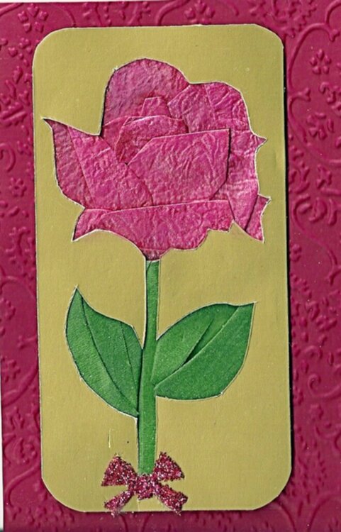 Fancy folded Iris foled rose. Pattern by Ria.