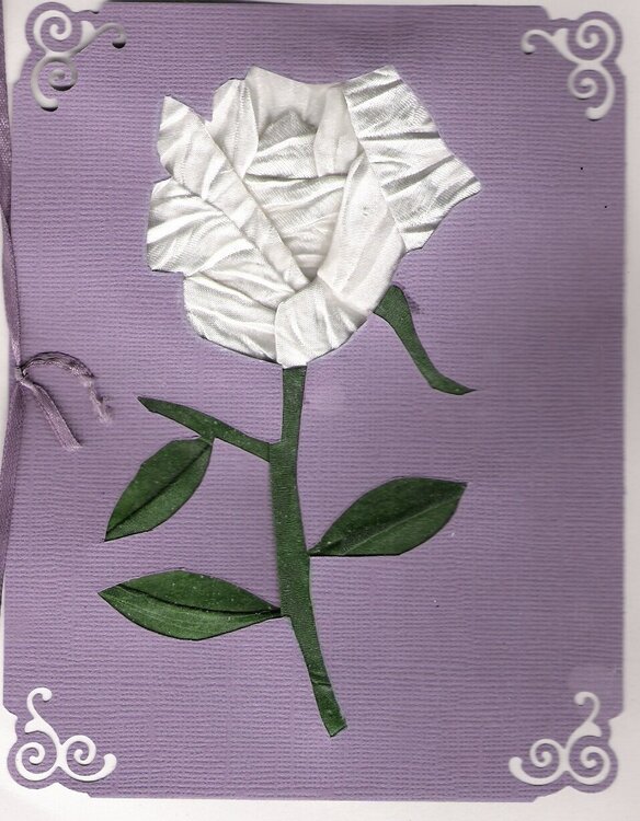 White fancy folded rose card. Pattern by Ria.