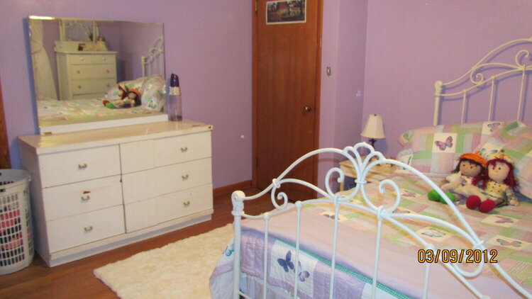DD&#039;s purple room-Full sized iron bed in place...