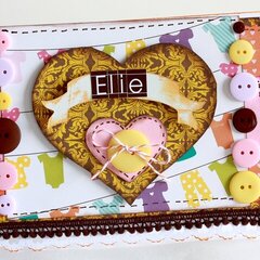 Button adorned "Elie" card