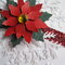 Close up of the Poinsettia and pine branches on the sparkly ribbon