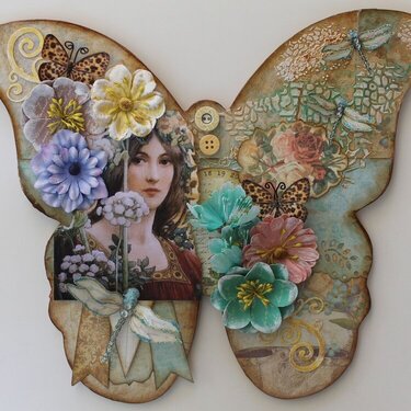 Altered wooden butterfly wall plaque