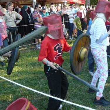 Children including my DS (red shirt) having a battle with swords made from dense foam.
