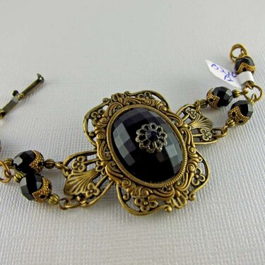 Vintage Inspired Faceted Onyx Cabochon and Antiqued Brass Bracelet
