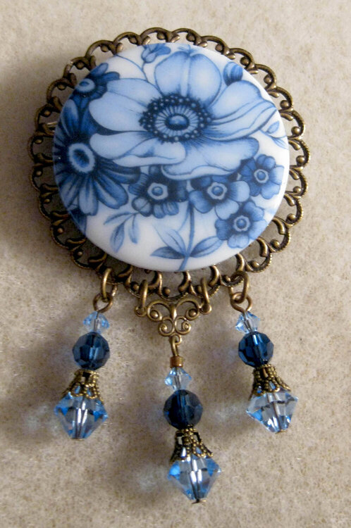 Vintage Blue and White Dutch Delft Cameo, Crystal, and Antiqued Brass Pin