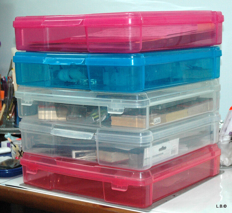 I gather supplies for future layouts in 12&amp;#8243;x 12&amp;#8243; Iris Scrapbook Cases.