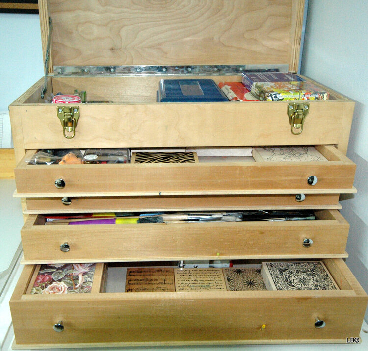 Wooden box with drawers.