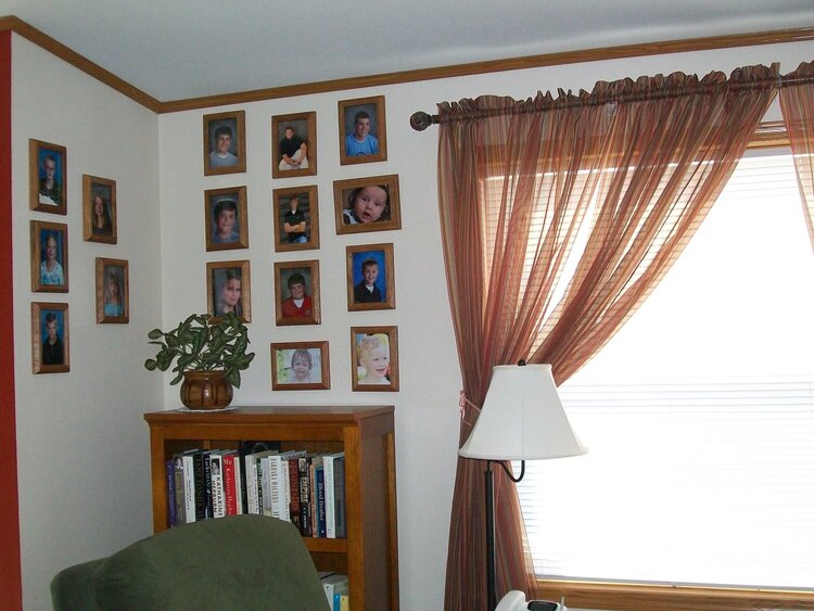 Family Room with &quot;wall of grandkids&quot;.