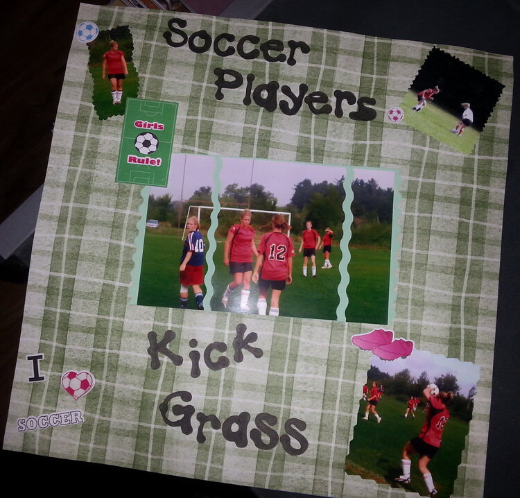 Soccer Players Kick Grass
