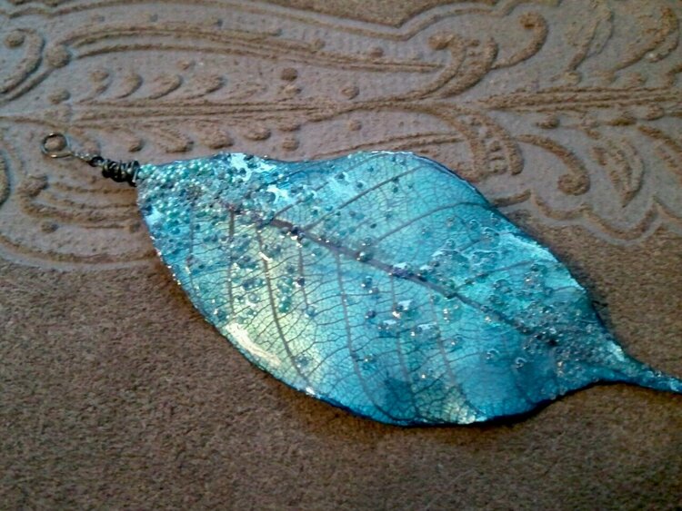 skeleton leaf pendant with glass beads