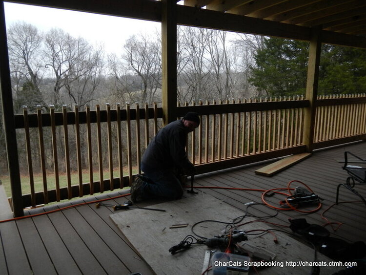 DH working on the deck railing