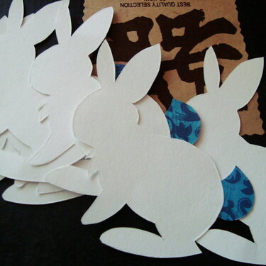 bunny cutouts with blue tails