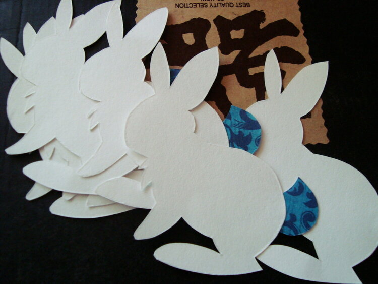 bunny cutouts with blue tails