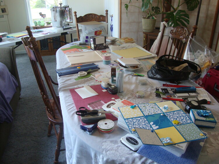 my messy messy dining room table!  after easter cards and other projects