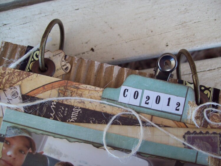 close up of those troublesome book rings!   CO mini album corrugated board
