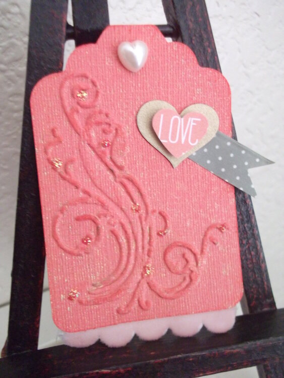 Embossed &quot;love&quot; tag