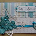 Turquoise card with flower