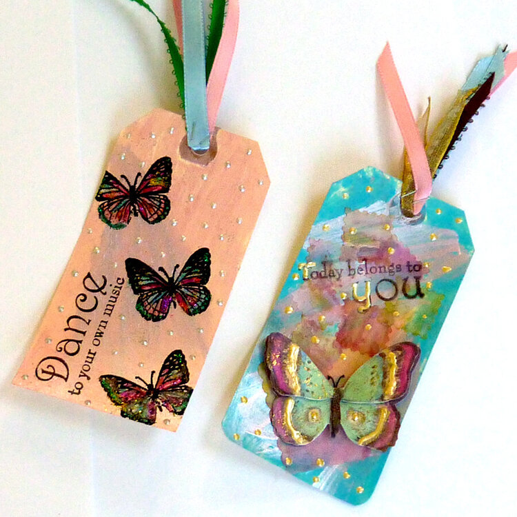 two mixed media tags