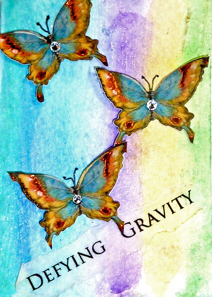defying gravity mixed media collage art card