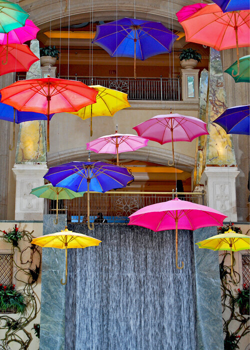 Rainbow falling umbrellas photograph