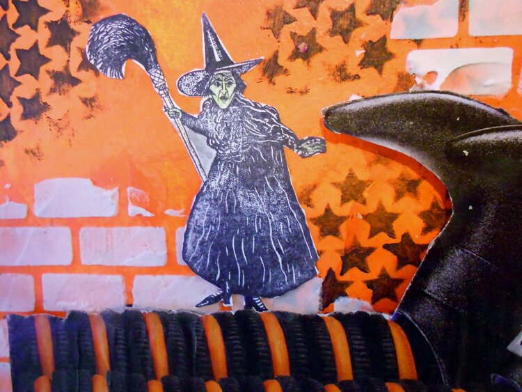 witch with broom close up