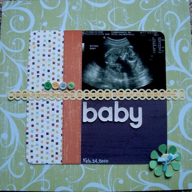 Baby&#039;s first scrapbook page
