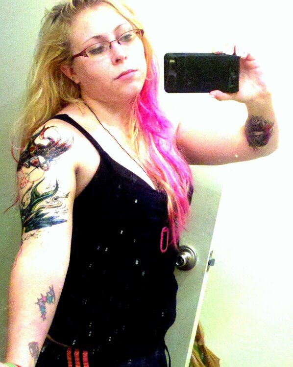 Me with pink hair and my tattoos