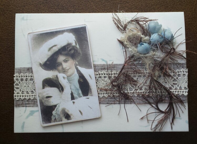 Vintage card with pale blue flowers