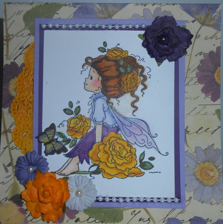 purple fairy with flowers