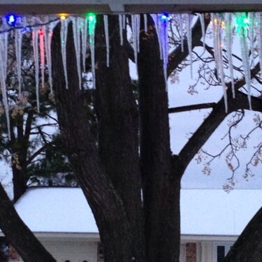 Icicles dragging our porch Christmas lights down