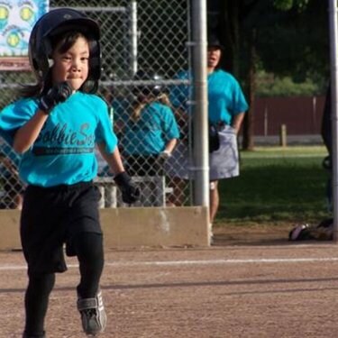 TBALL ACTION-Julissa getting to 1st base