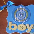The cover of a chipboard baby boy book
