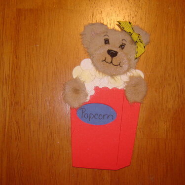 tear bear peeking popcorn