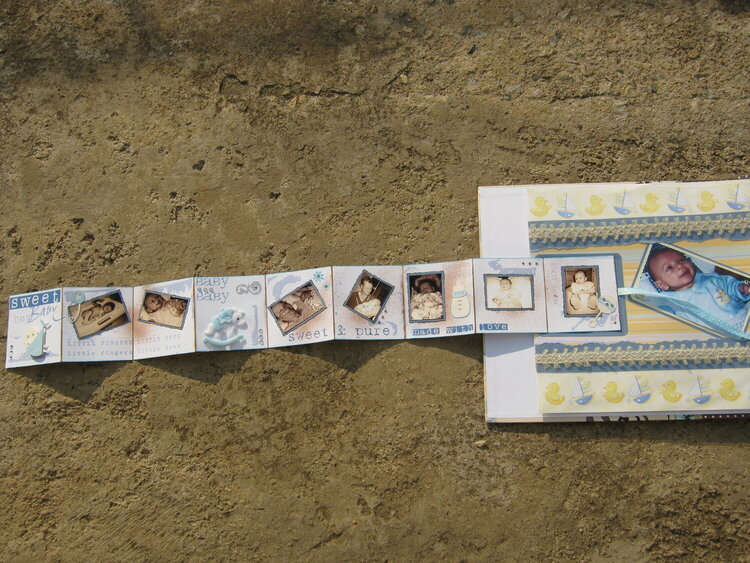Leathan baby page 2 with open accordian mini album