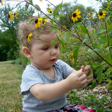 Baby in a Flower Garden
