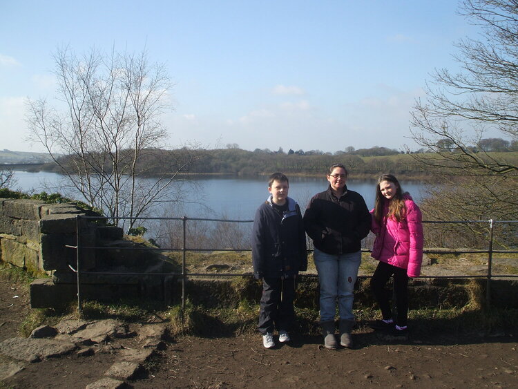 Rivington castle with the backdrop of the reservoir