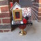 Black white and red altered birdhouse