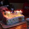 The birthday cake all lite up