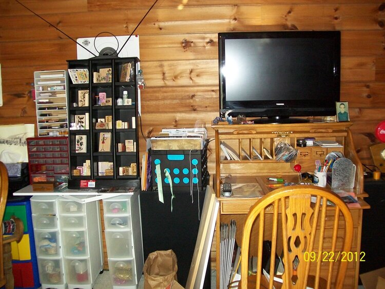 BEFORE: TV wall! Entertainment! With stamp storage.