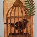 Bird in a cage tag