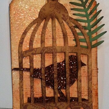 Bird in a cage tag