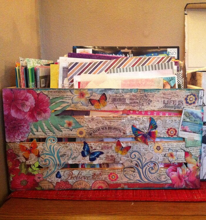 Decoupaged wooden crate to keep scrapbook papers