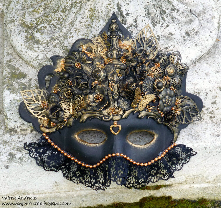 Mixed media black and copper mask