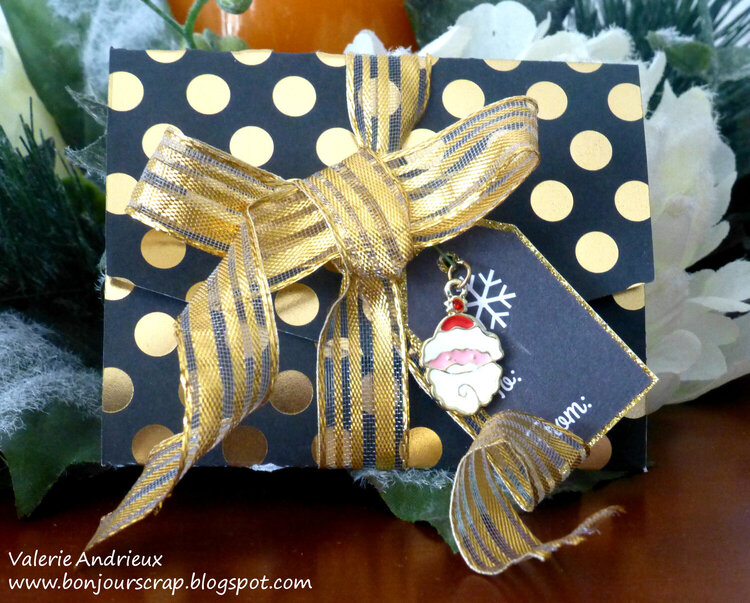 Black and gold gift card holder